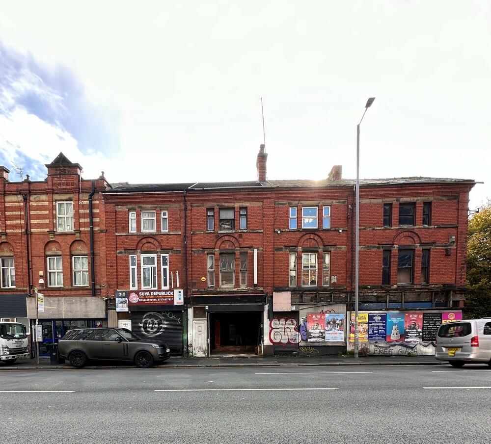 Freehold Mixed-Use Premises with Redevelopment Potential